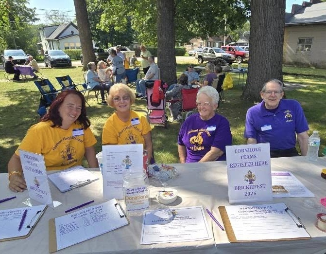 HHSAA board members at the sign-in table.