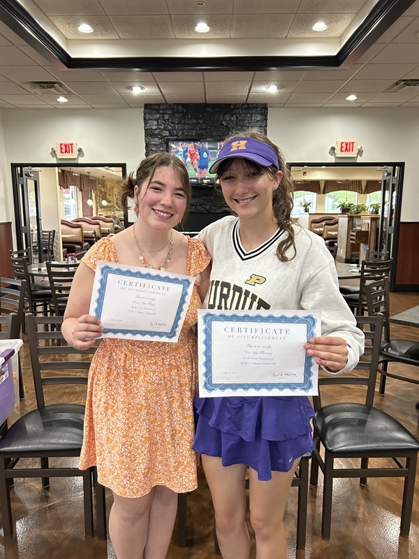 Scholarship winners Grace Krejci and Isis Fleming